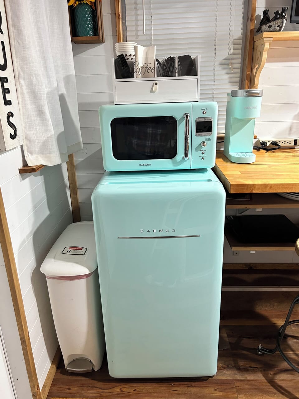 The fridge, microwave, Keurig coffee maker.