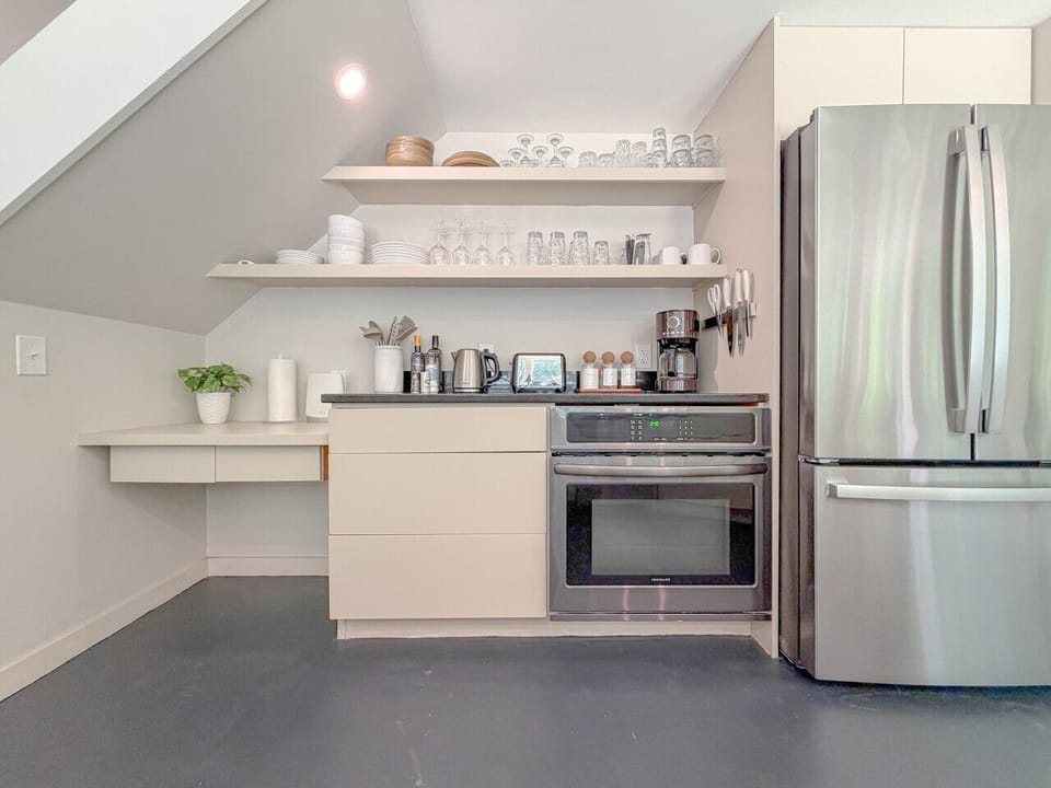 Fully equipped with all the essentials, this kitchen offers everything needed to cook, dine, and entertain comfortably during your stay.