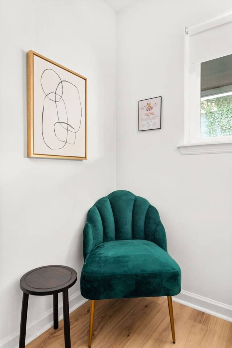 An in-unit washer and dryer are tucked next to the dining area for effortless laundry.