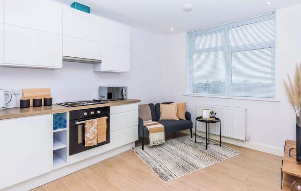 Open-plan kitchen and living space with bright airy feel
