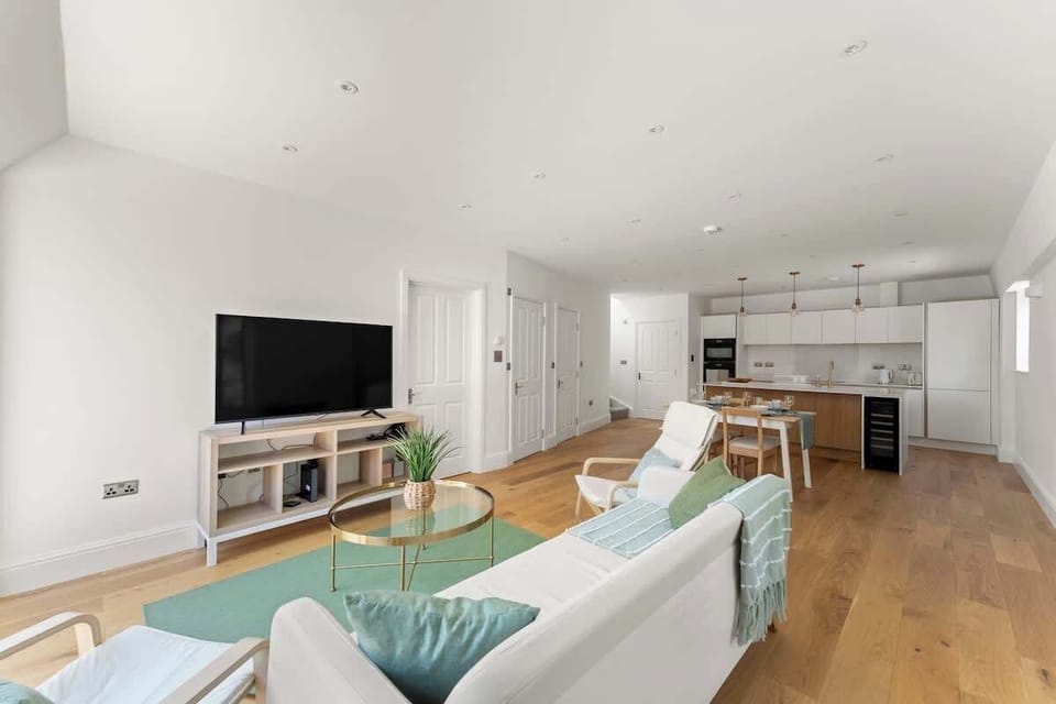 Comfortable living room with large television and inviting seating area