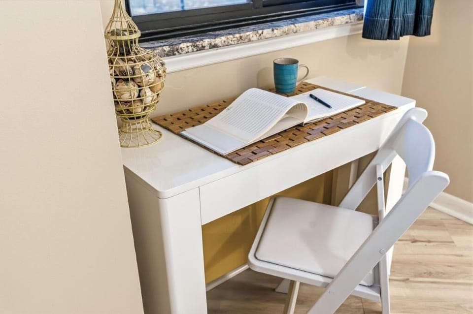 Convenient desk area for completing work or setting up your agenda for the day!
