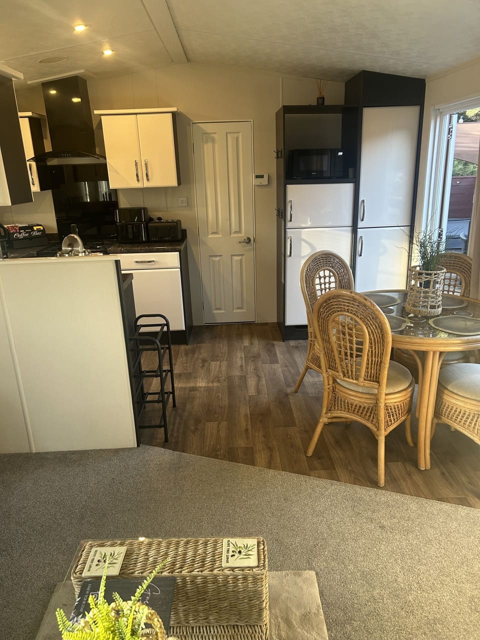 Freezer, Fridge, Microwave and fully stocked kitchen with all utensils, plates, cups etc.