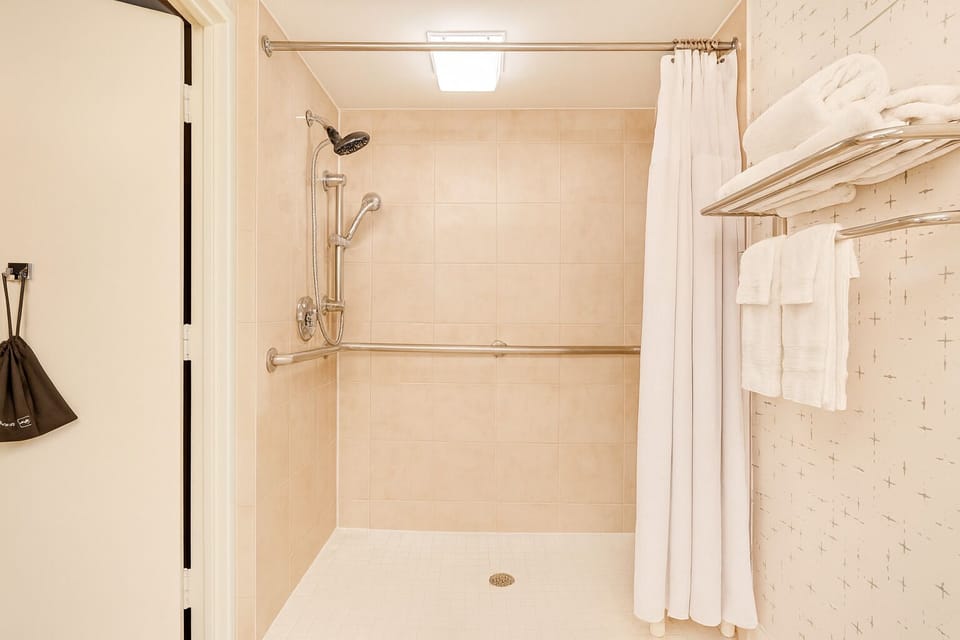Rinse off easily in the spacious walk-in shower.