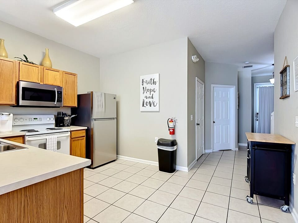 Fully equipped kitchen with modern appliances and plenty of counter space.