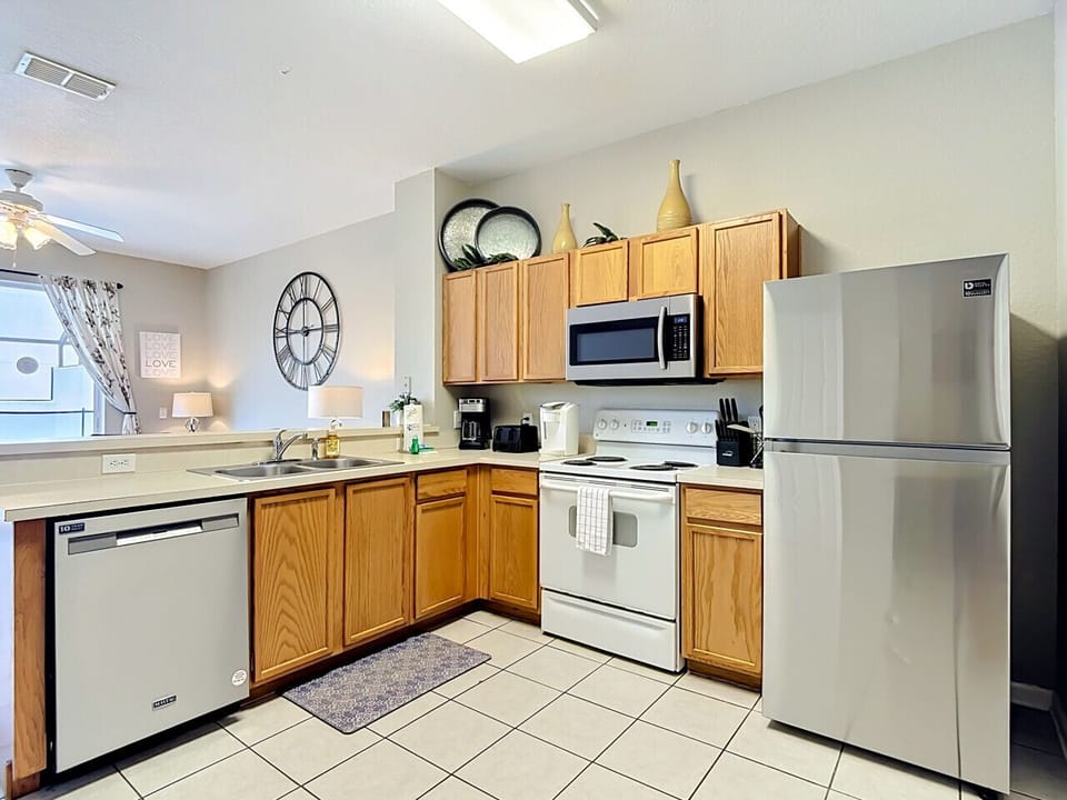 Well-equipped kitchen with modern appliances and plenty of prep space.