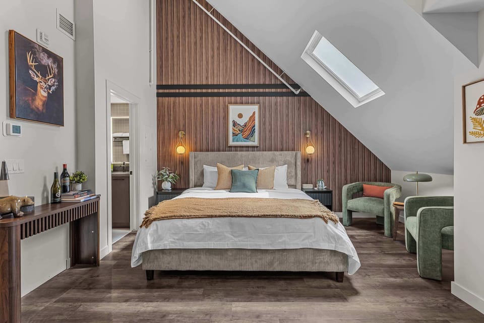 Cozy Nights Await. Spacious bedroom with impeccable decor and amazing wallpaper