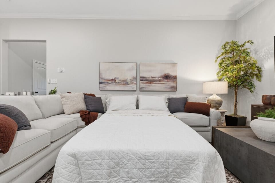 The living room doubles as an additional sleeping area.  Bedding for the full-sized sofa bed is stored in the console under TV 1.