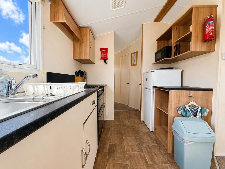 This caravan on The Chase Holiday Park is bright and airy. The large windows allow for lots of natural light to flood into the caravan making it feel bright.