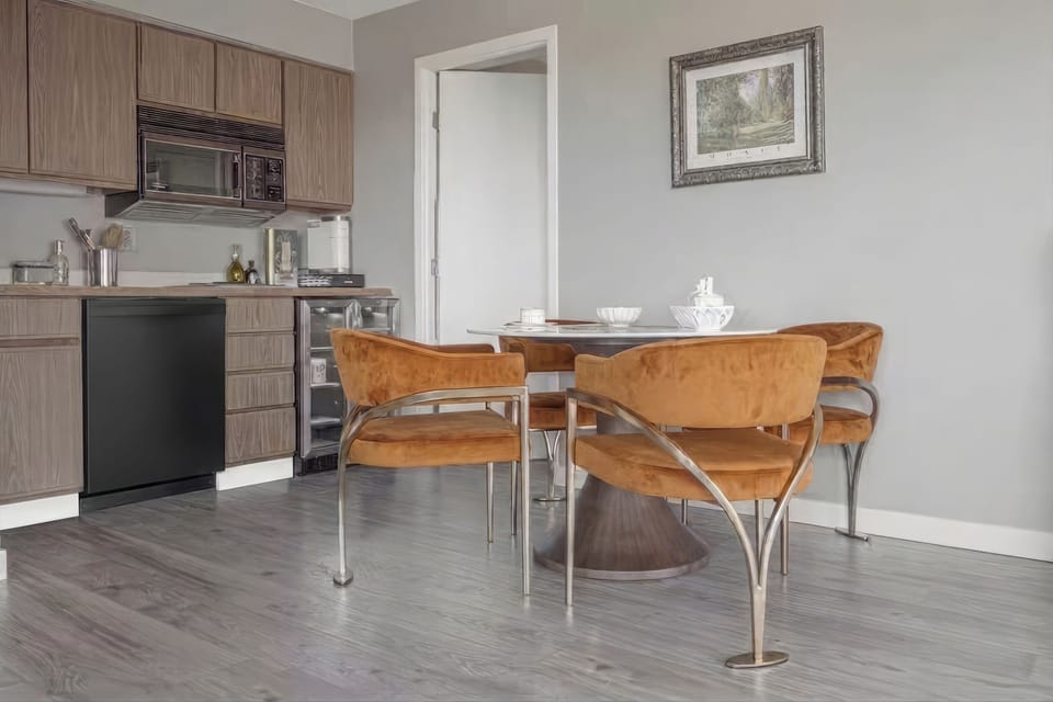 Contemporary dining for four with designer seating and fully equipped kitchen