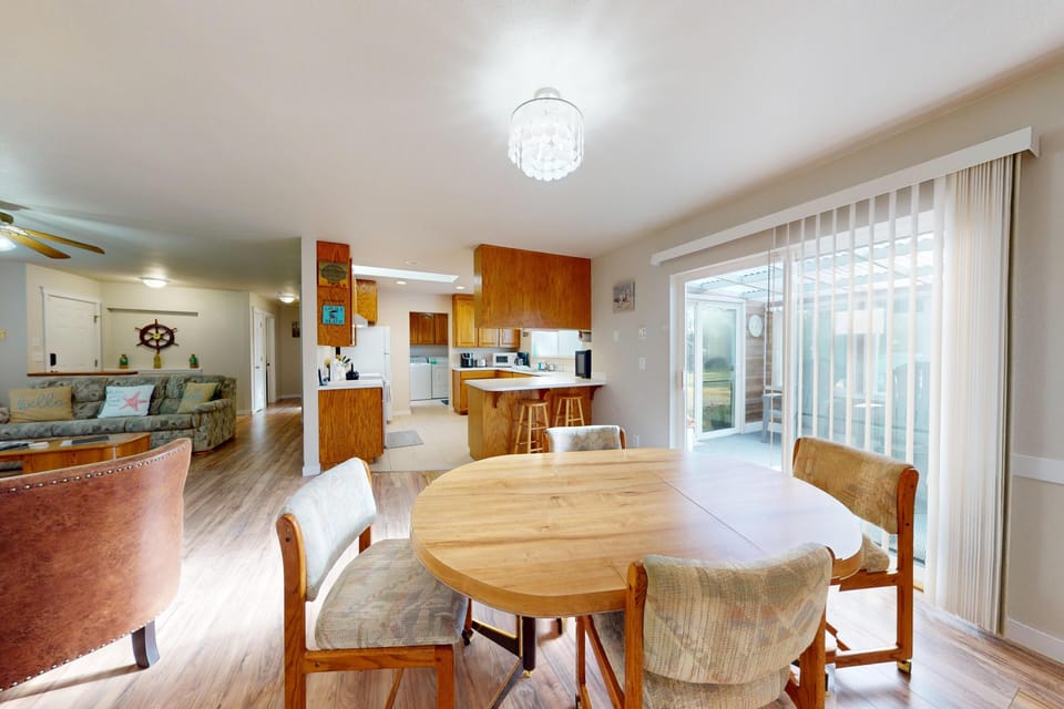 Open dining area with easy access to the kitchen and outdoor patio.