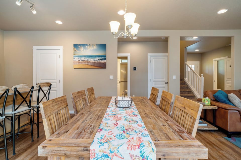 Gather everyone around this spacious dining table where shared meals and laughter create lasting vacation memories in your home away from home.