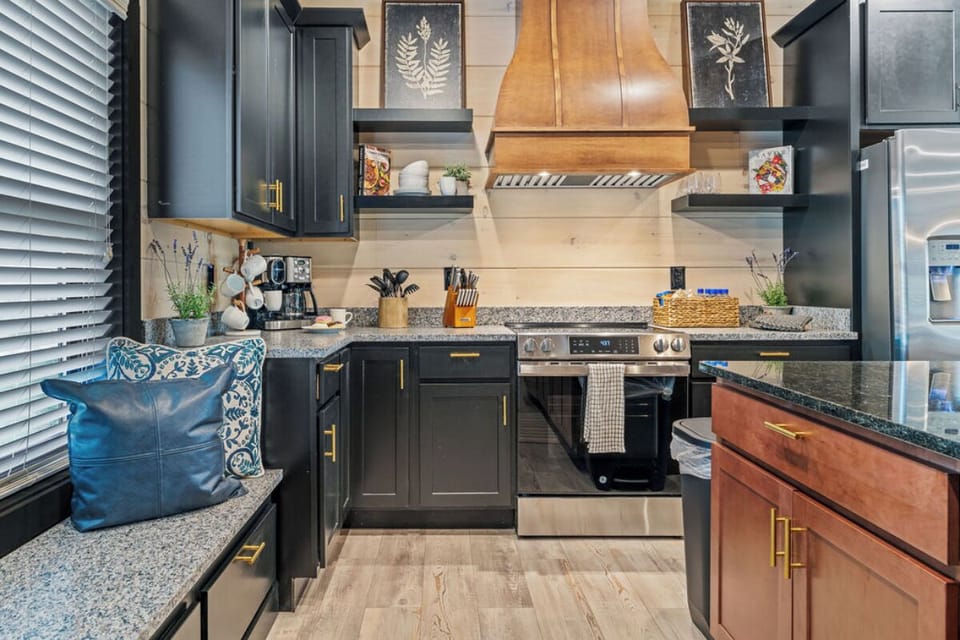 Your gourmet kitchen awaits with granite counters, stainless appliances, and a cozy breakfast nook where you'll savor morning coffee.