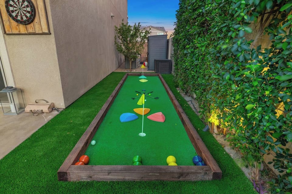Unleash your competitive side on this versatile turf court, seamlessly transforming from a classic bocce ball setup to a customizable mini-golf course with endless obstacle challenges for the whole group!