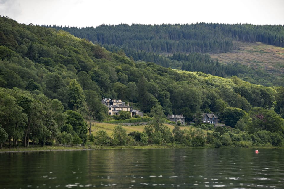 View across the lake of Brantwood and the Coachman's Quarters