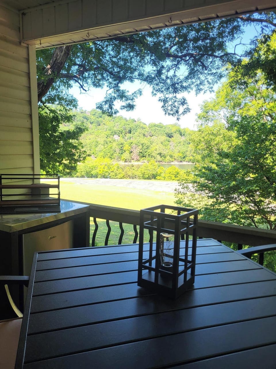 Beautiful water views, outdoor refrigerator, 24 in smart TV and grill.