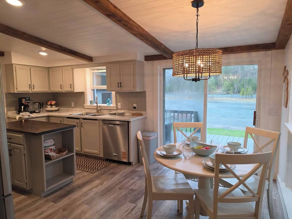 Eat in kitchen with lake views. Seating for 4.