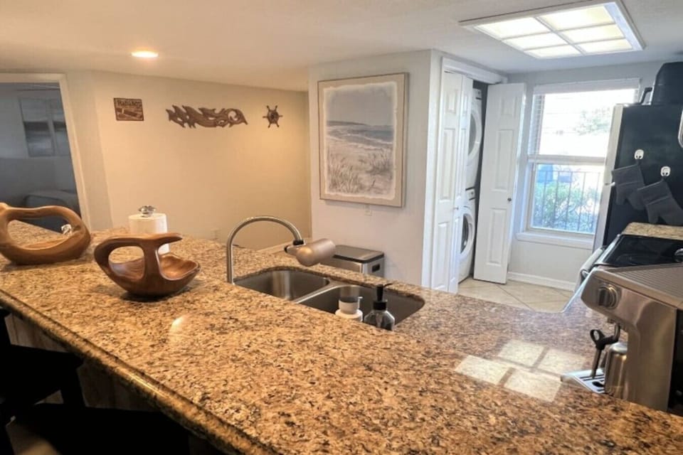 Kitchen w/ Laundry area