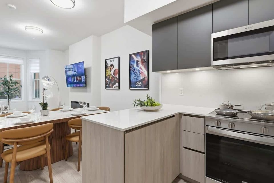Modern kitchen with stainless steel appliances and sleek finishes