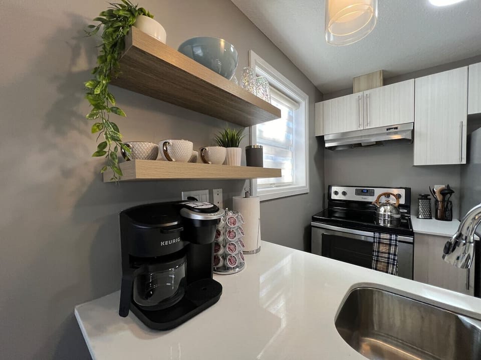 Coffee maker and all the kitchen essentials for your convenience.