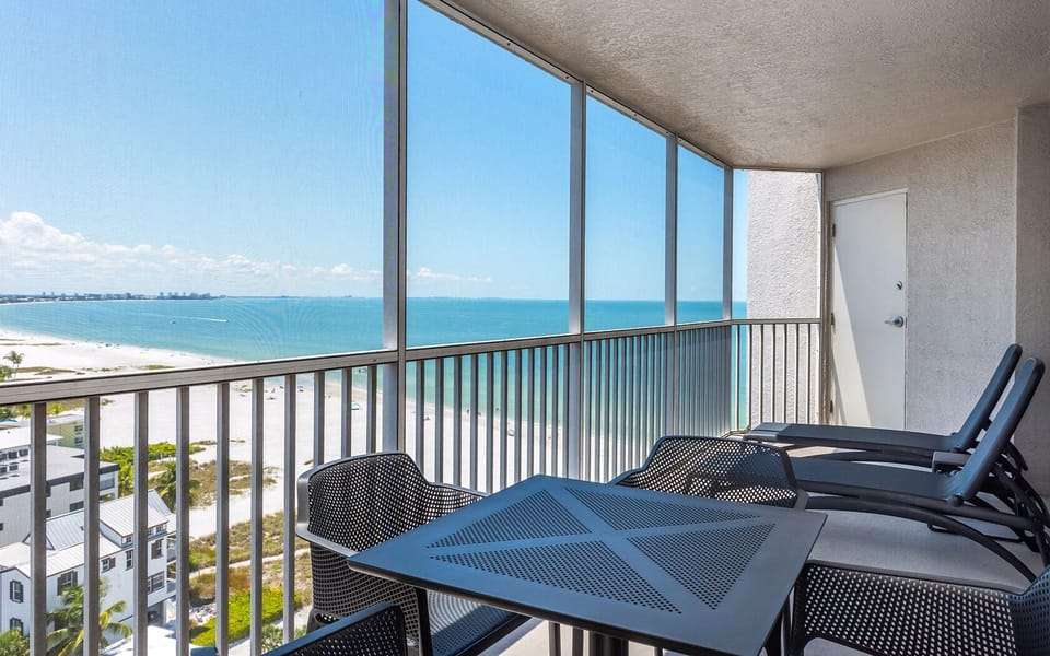 Sip morning coffee as endless turquoise water fills the horizon.