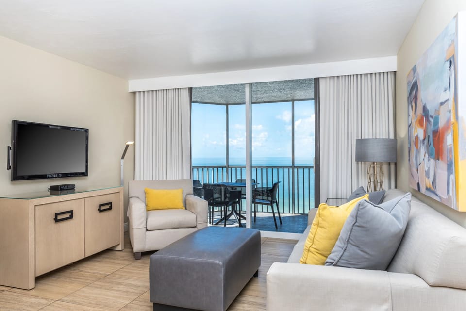 Unwind in a bright lounge with sweeping ocean views.