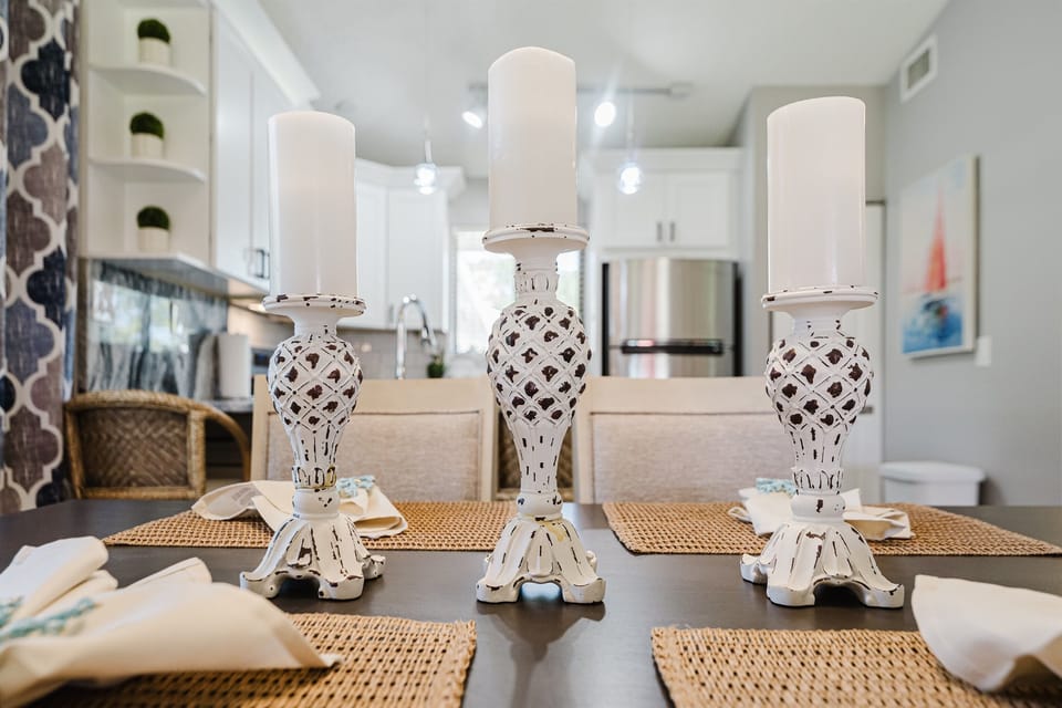 Bright open-concept living with dining for 6 and a fully upgraded kitchen featuring modern finishes, breakfast bar seating, and everything you need to cook and entertain

