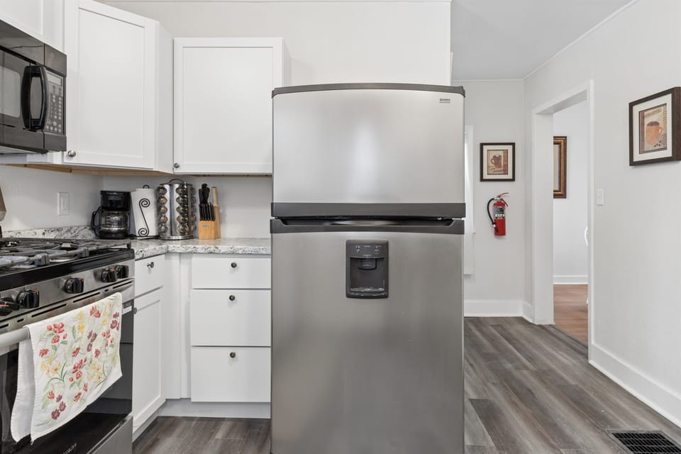 The kitchen flows into the dining room.
