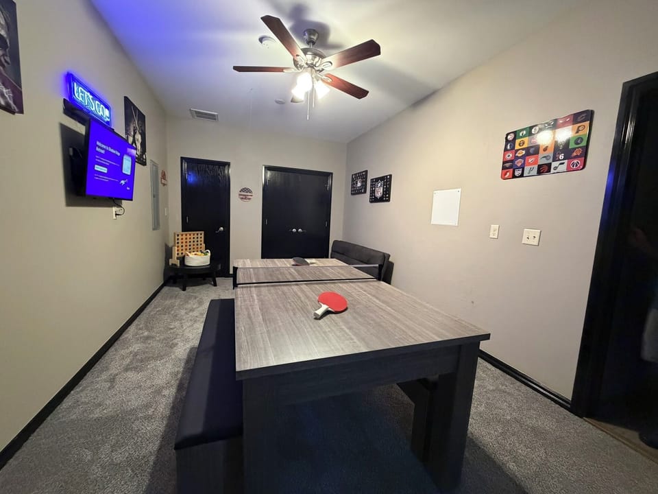 Private game room with ping pong, TV, and a fun indoor hangout space