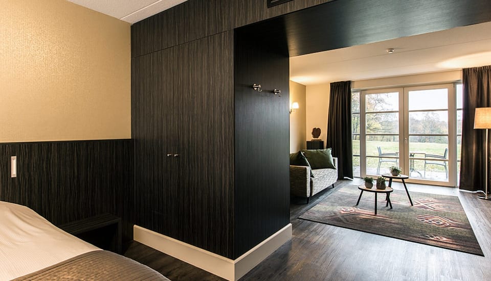Unwind in a stylish suite with calming garden views.