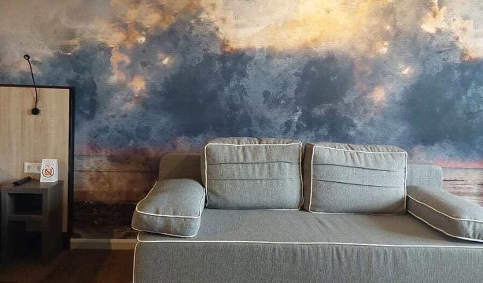 Stretch out on the sofa for a calm evening recharge.