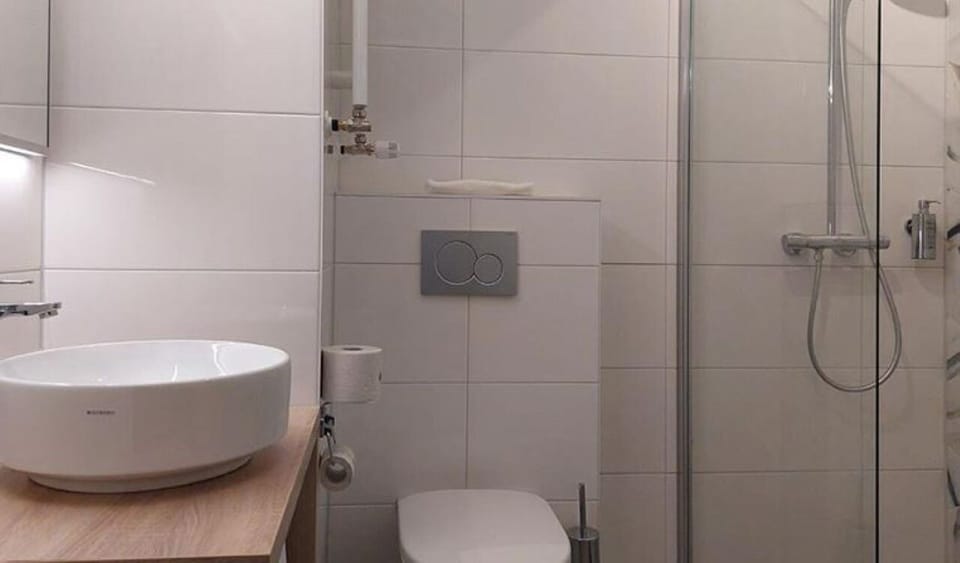 Step into a bright, modern bathroom for an easy refresh.