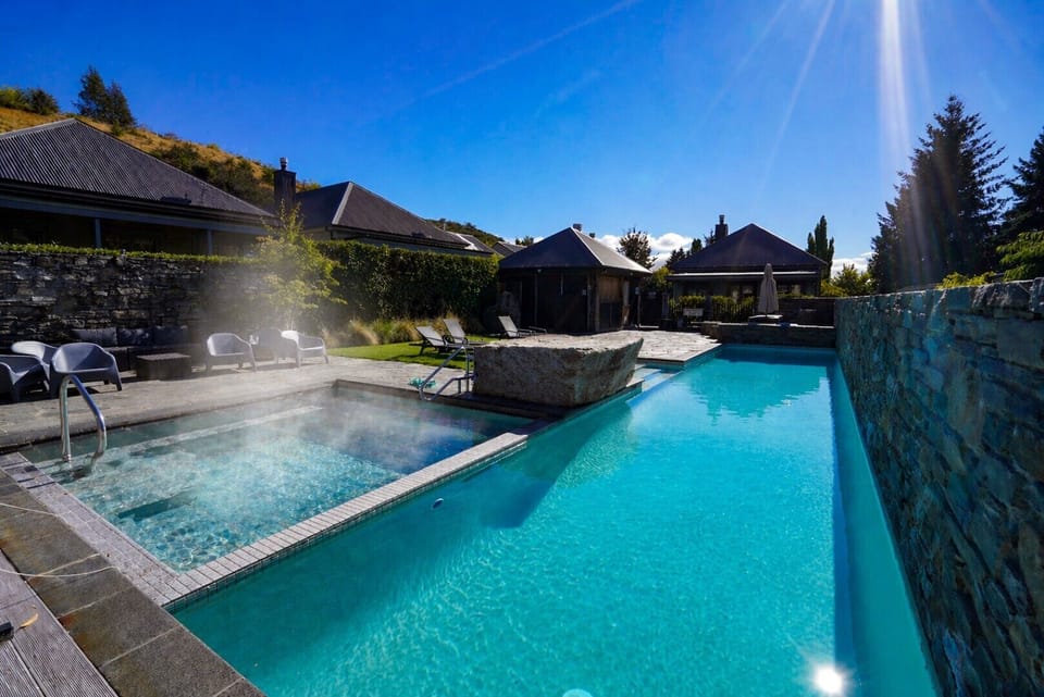 unwind in the heated pool and hot tub