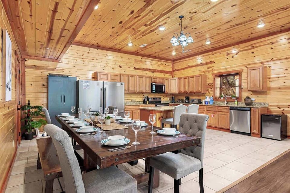 Host memorable meals around a spacious dining table, just steps from a fully equipped kitchen.
