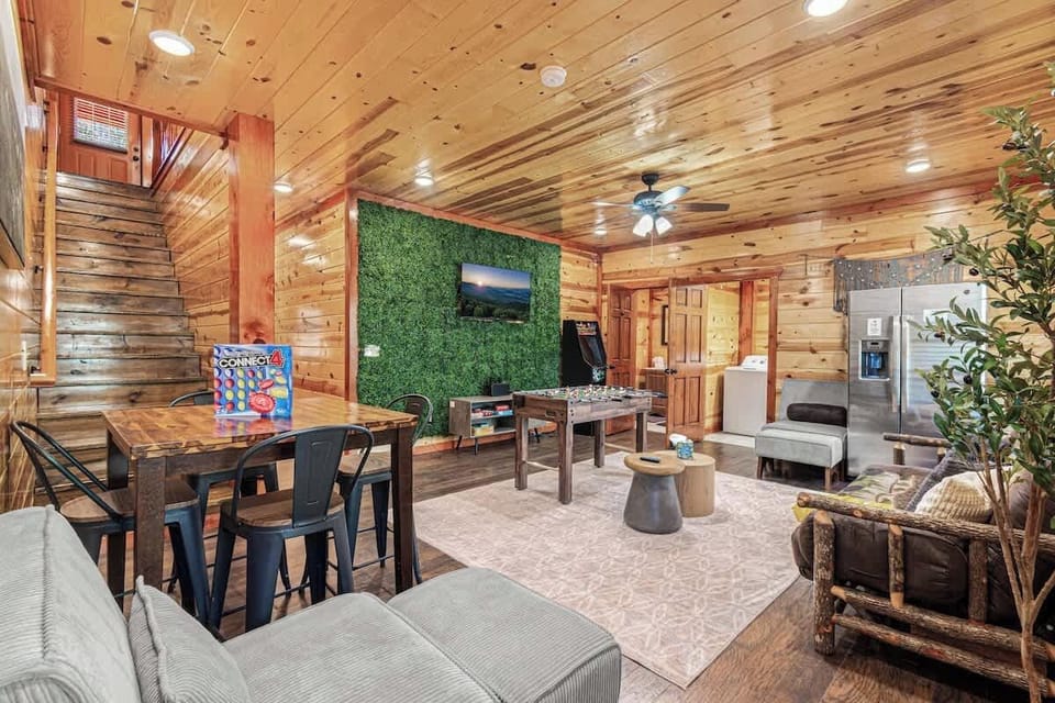 Head to the game den with foosball, arcade games, and a game table, plus a sofa that converts to a futon for lounging or an extra place to sleep.