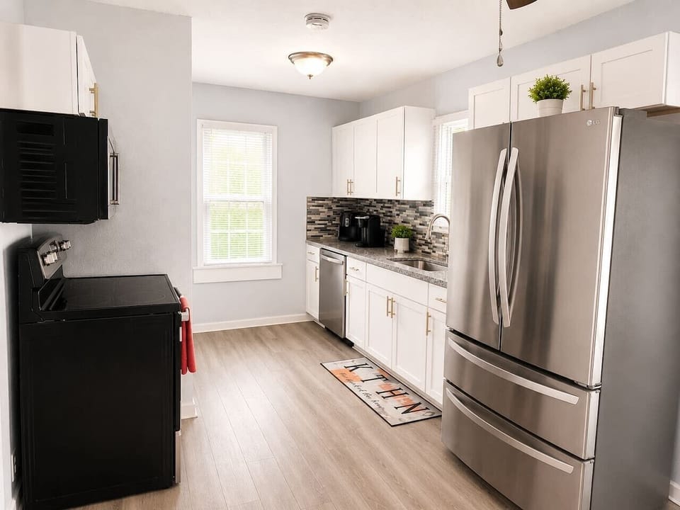 Updated kitchen with modern appliances and everything needed for your stay