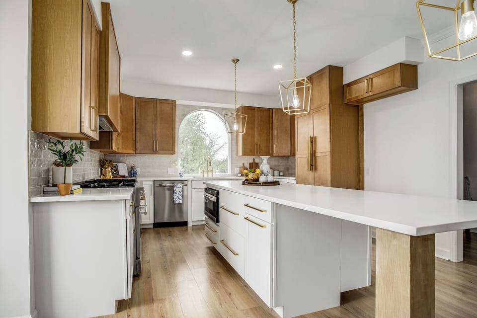 Spacious gourmet kitchen with natural light and elegant finishes.