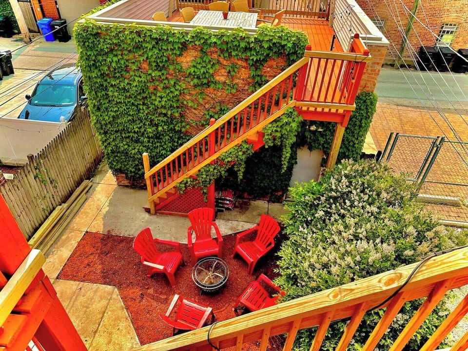View of Shared backyard seating area & rooftop deck access