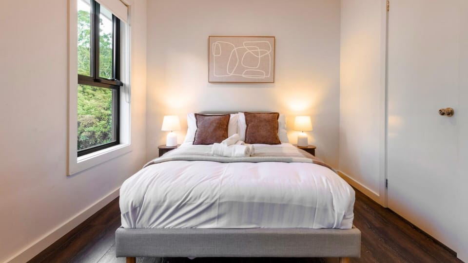 Bright and welcoming Double bedroom with styling and built-in storage.