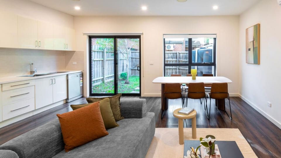 Bright and inviting living space overlooking the outdoor area.