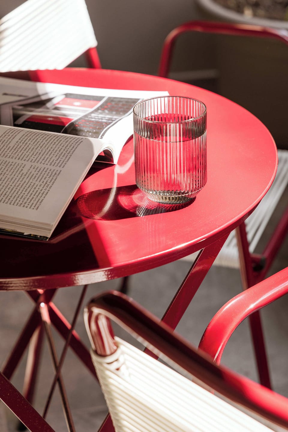 Vibrant Red Dining Area with Artistic Decor