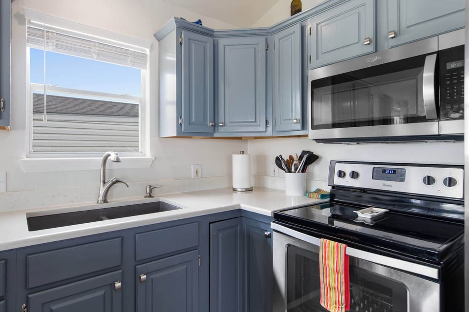 Whip up dinner with a full stove, oven, and plenty of counter space