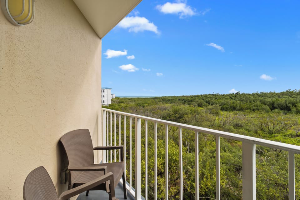 Sip morning coffee outside with breezy, open-air views.