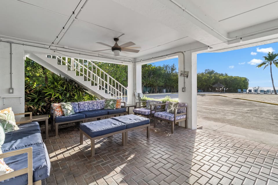 Sip morning coffee in an airy, covered outdoor lounge.