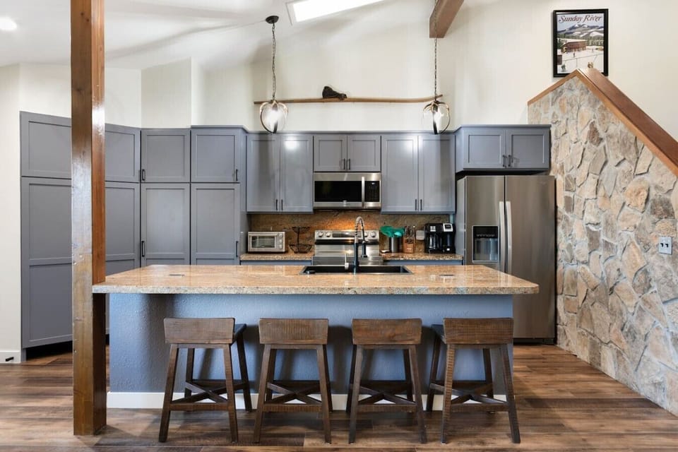 Fully equipped kitchen with large island and bar seating