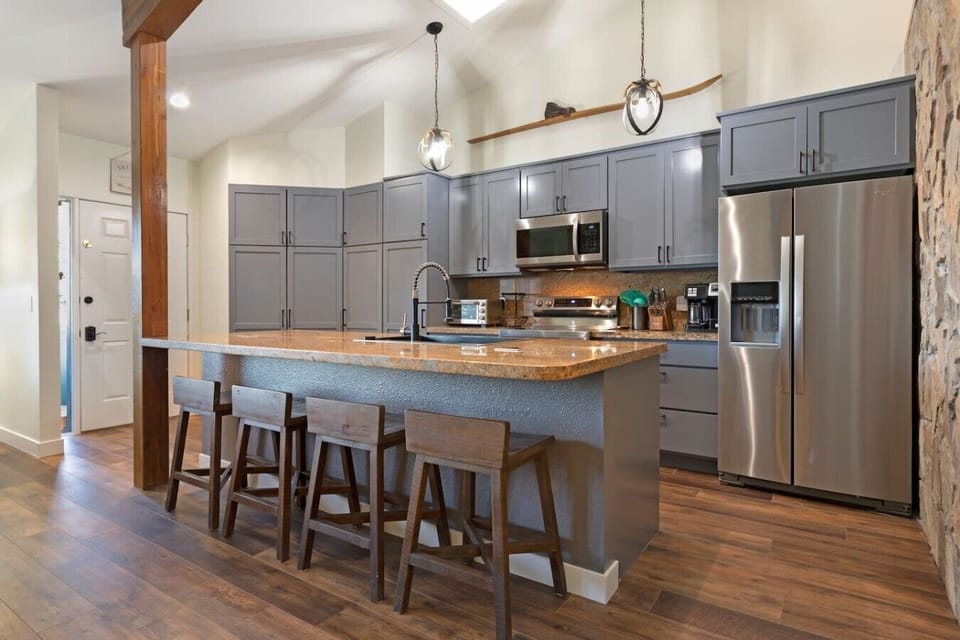 Fully equipped kitchen with large island and bar seating