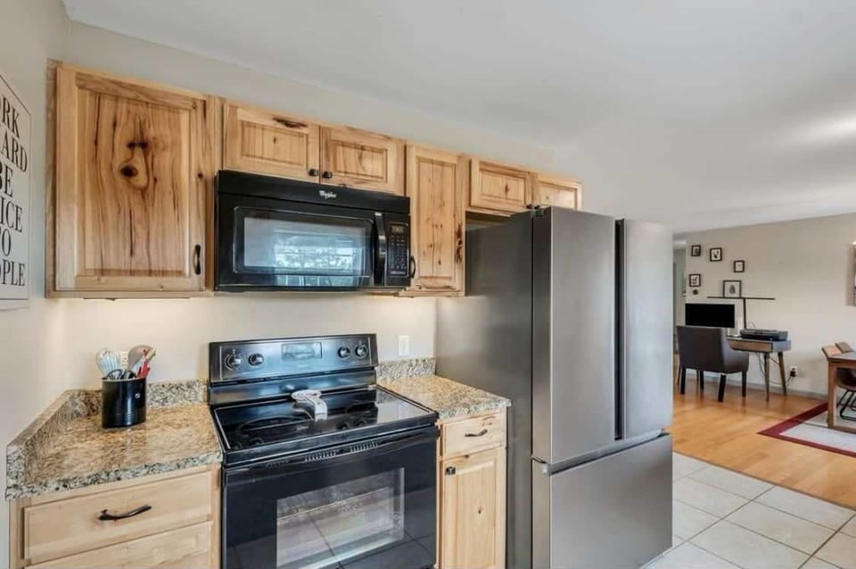 Prepare meals with ease in this fully furnished kitchen.