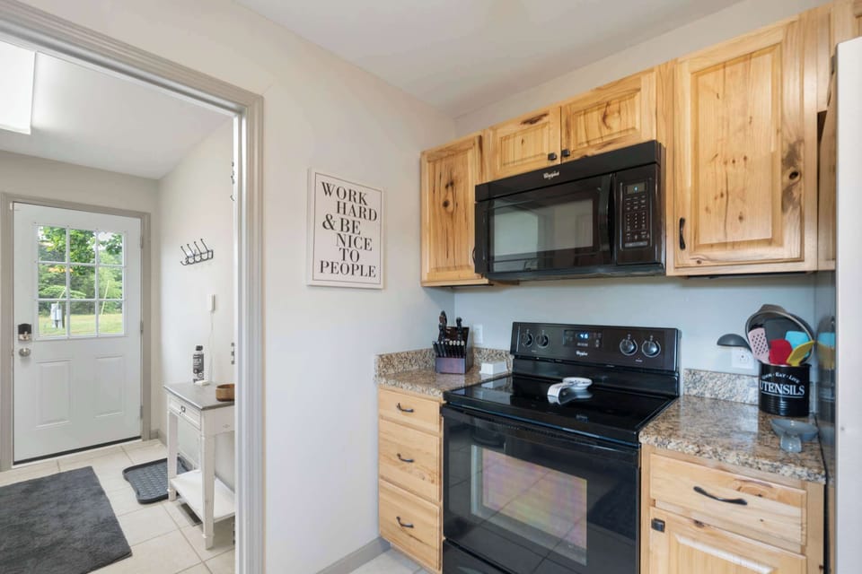 Modern kitchen designed for convenient home cooking during your stay.