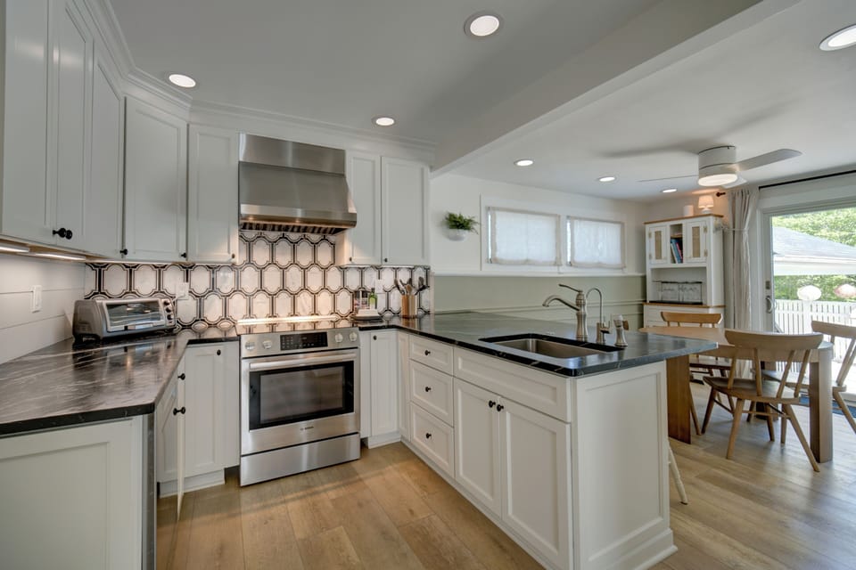 Recently renovated kitchen open to dining area. Soapstone countertops,