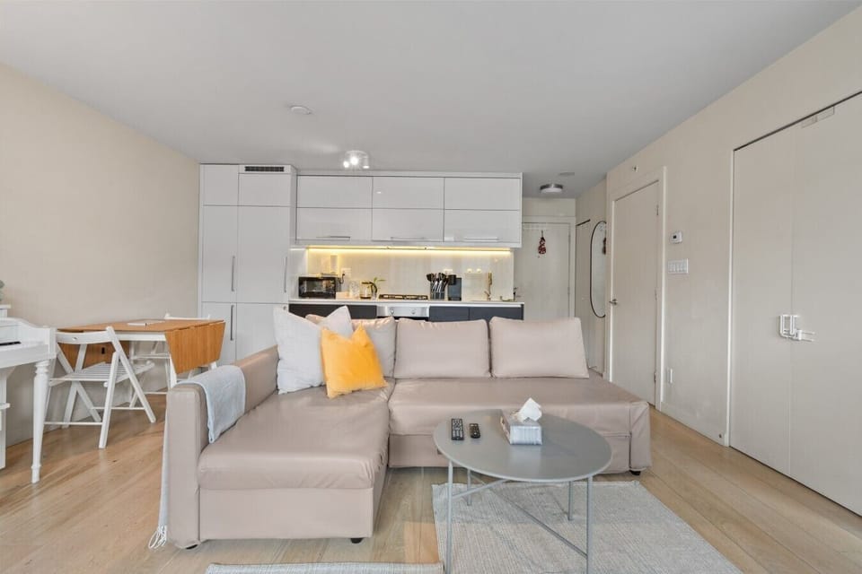 Living Room: Modern elegance with sleek furnishings and warm lighting for relaxing evenings!